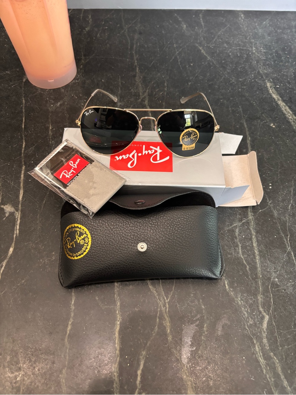 Ray-Ban Gold Frame Sunglasses with Black Lenses